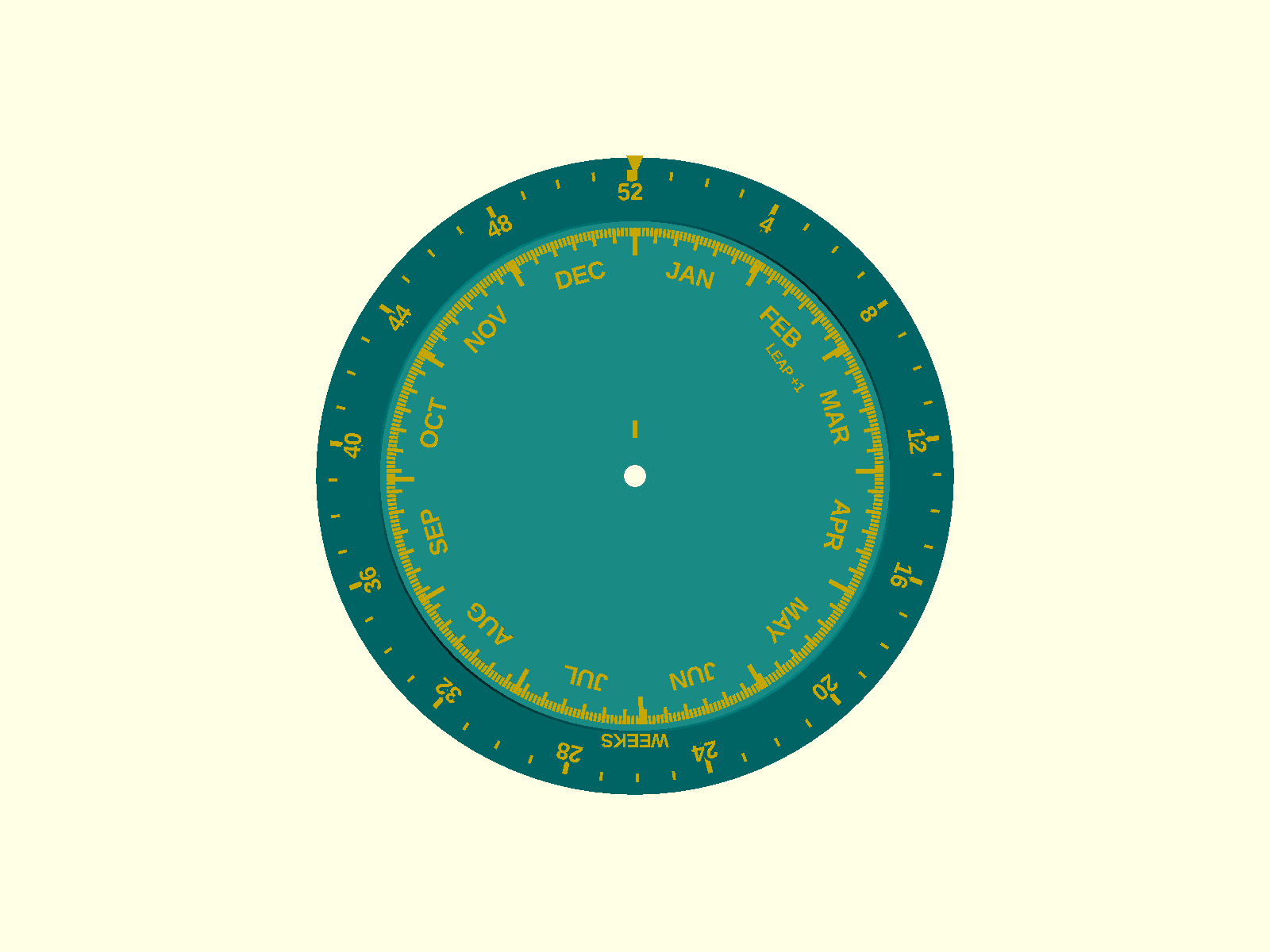 Top-down view of the assembled wheel: the inner rotor shows JAN through DEC with fine day ticks, the outer base rim is numbered 4, 8, 12 ... 52 in weeks, and an index arrow sits at 12 o'clock